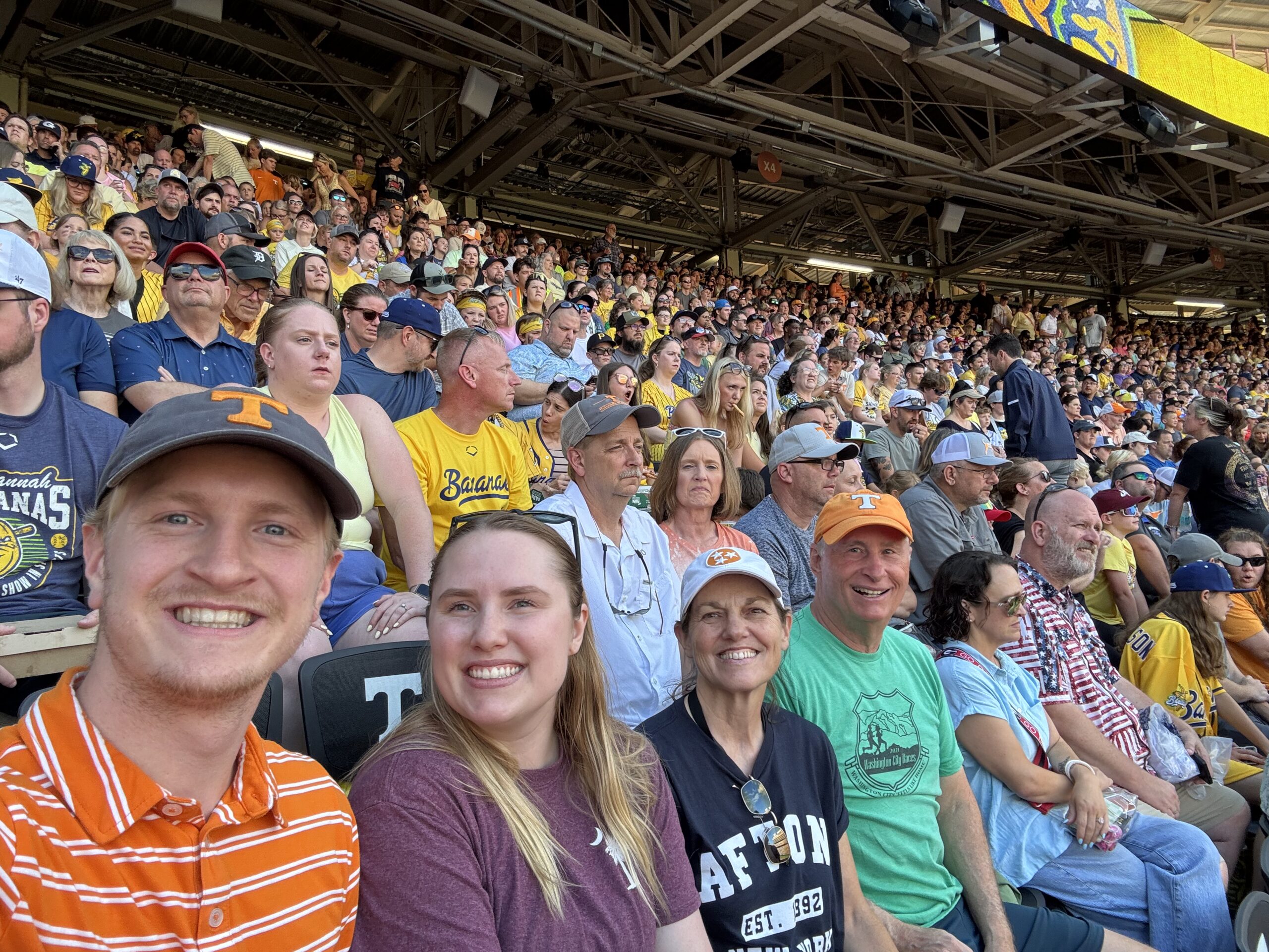 Ryan Hoppie and group at a sporting event